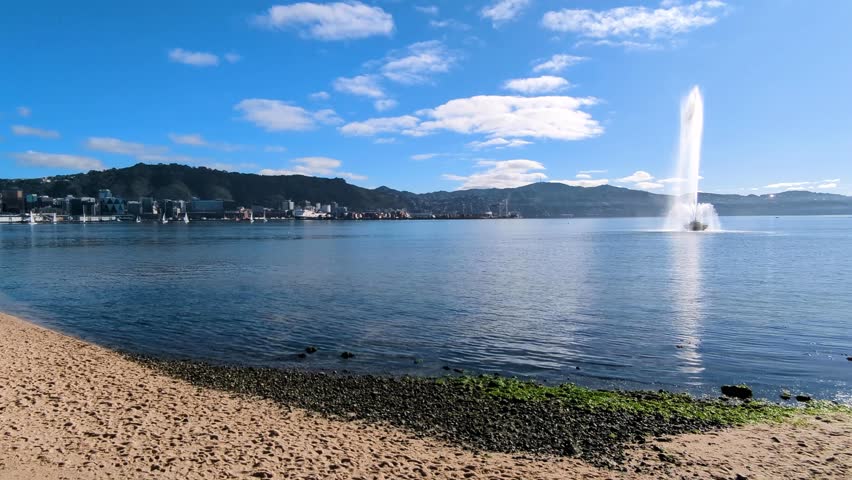 Scenic view of Wellington harbour and water fountain at Oriental Bay beach in capital city Wellington, New Zealand Aotearoa