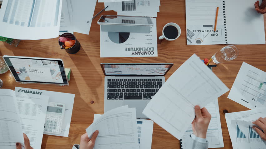 Hands, people and giving documents in office for accounting, finance report and company funds. Staff, team and above with paperwork for timelapse, financial statement and tax compliance information