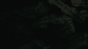 Search light passing over torn, discarded classified top secret papers - Powered by Shutterstock - Get 15% off with code: PIKWIZARD15