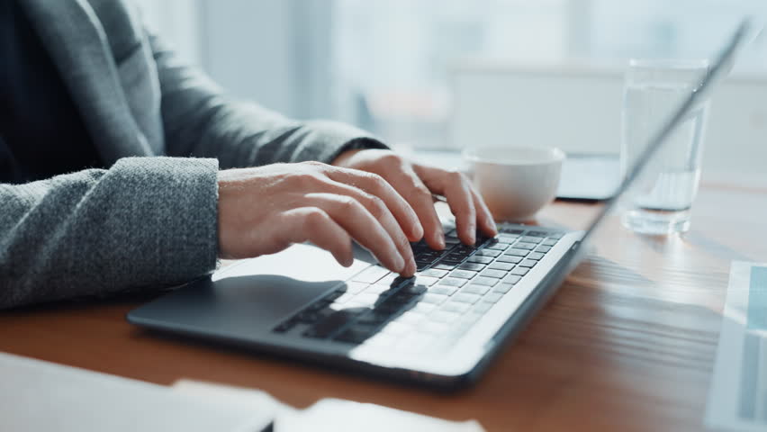 Finance, businessman and hands typing on laptop for account management or online report. Office, keyboard or accountant with technology for taxes compliance, investment project or auditing budget