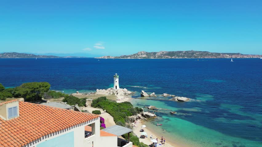This stunning drone shot captures the Lighthouse of Punta Palau, set against turquoise waters and sculpted granite rocks—one of Sardinia’s most scenic seaside spots.