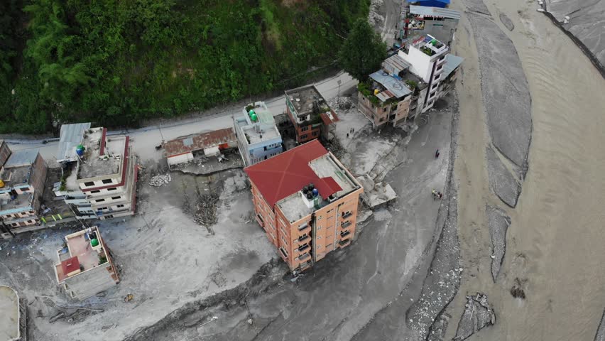 Drone footage reveals catastrophic flooding in Melamchi Bazaar, Nepal. Beyond rain, climate change and glacial melt worsened the disaster, leaving destruction and displaced communities in its wake.