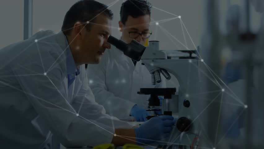 After partner tapping tube, lab scientists examining slide as digital overlay pulsing for analysis. Research, collaboration, innovation, analysis, research facility, scientific, technology