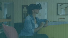 Woman scanning home VR scene on sofa, extending finger and tapping binary code menu for navigation. Technology, innovation, immersive, futuristic, entertainment, digital, relaxation - Powered by Shutterstock - Get 15% off with code: PIKWIZARD15
