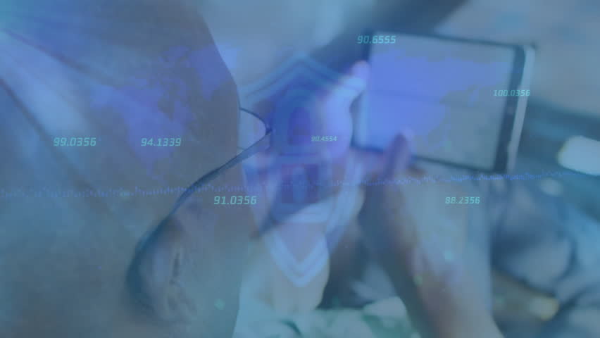 Senior man tapping tablet, typing laptop, floating numeric codes animating shield engaging security. Technology, cybersecurity, digital protection, data security, modern workspace, elderly, innovation - Powered by Shutterstock - Get 15% off with code: PIKWIZARD15