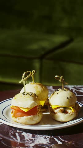 Trio of Small Gourmet Burgers – Close-Up of Mini Sliders with Fresh Ingredients in 4K Ultra HD