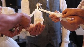 Mothers light the newlyweds' candle. Family hearth. - Powered by Shutterstock - Get 15% off with code: PIKWIZARD15