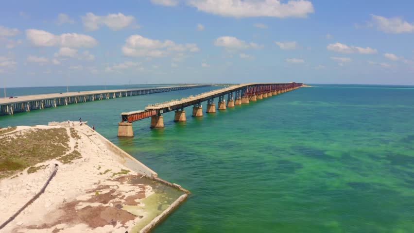 Scenic view of the iconic Seven Mile Bridge basking in the Florida sun, stretching across turquoise waters in the beautiful Florida Keys, USA. Perfect tropical paradise shot.