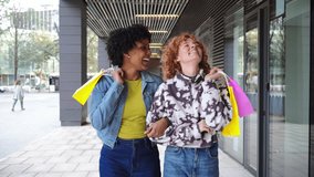 Two cheerful friends celebrating their successful shopping trip, laughing and enjoying their time together with colorful shopping bags in hand, radiating happiness and excitement in their joyful - Powered by Shutterstock - Get 15% off with code: PIKWIZARD15