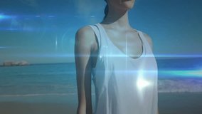 Woman facing camera on shore, nodes appearing and lines expanding across upper body tech demo. Futuristic, neural, connectivity, serenity, innovation, digital, technology - Powered by Shutterstock - Get 15% off with code: PIKWIZARD15