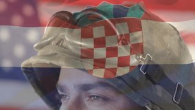 Soldier tracking gaze under US Croatia overlays drifting across helmet during technology training. Military, patriotism, discipline, convergence, resilience, innovation, tactical - Powered by Shutterstock - Get 15% off with code: PIKWIZARD15