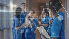 Medical team reviewing report in hospital, initiating floating data overlays as nurse showing chart. Healthcare, collaboration, professionalism, technology, patient care, communication, diagnostics - Powered by Shutterstock - Get 15% off with code: PIKWIZARD15