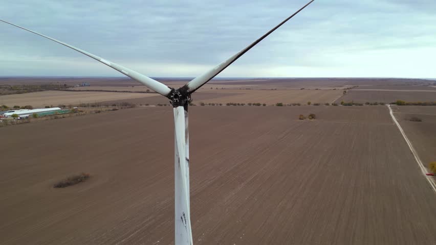 Close up footage of a burned down wind turbine generator. Lightning strike of windmill or overheating caused meltdown of power generator engine and mechanical system. Destroyed infrastructure Disaster