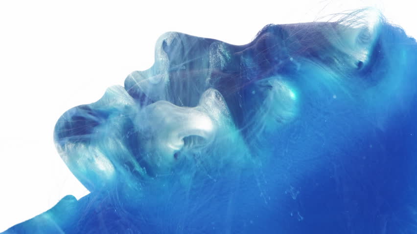 Vertical video. Spiritual enlightenment. Esoteric energy. Blue glitter ethereal mist double exposure profile face silhouette of peaceful woman isolated on white.