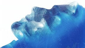 Vertical video. Spiritual enlightenment. Esoteric energy. Blue glitter ethereal mist double exposure profile face silhouette of peaceful woman isolated on white. - Powered by Shutterstock - Get 15% off with code: PIKWIZARD15