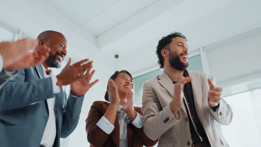 Team building, stack hands and business people clapping for celebration, goal achievement and target. Community, happy group and huddle for applause, motivation or success in office with low angle