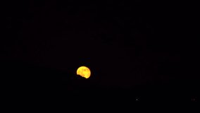 moon rose from behind the mountain in the outskirts of Fukuoka Prefecture, Japan.  x4 speeds without sounds - Powered by Shutterstock - Get 15% off with code: PIKWIZARD15