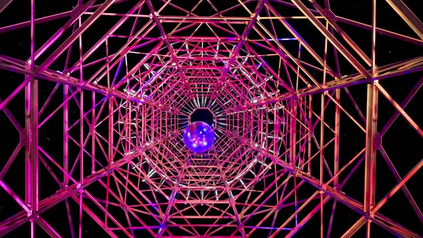 Standing inside and looking up at the Tesla Tower at the INmusic Festival in Zagreb, Croatia