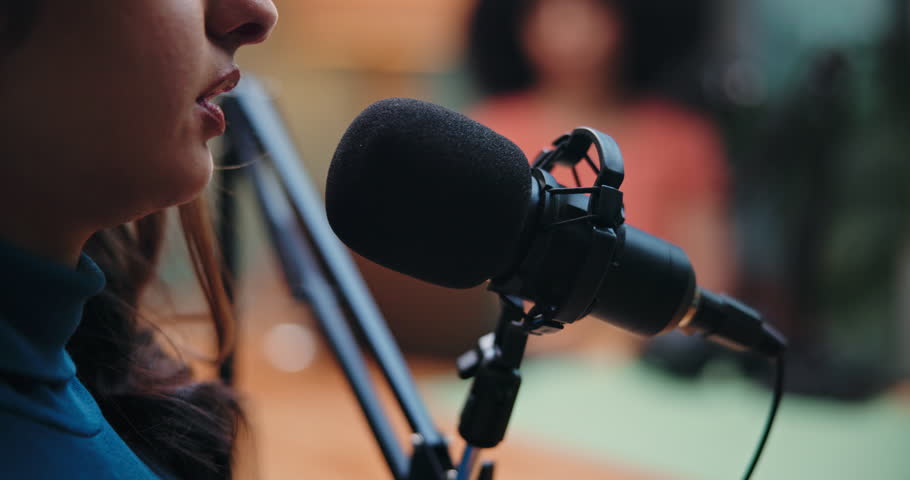 Mouth, woman and host with mic for podcast, content creation or live stream of interview on website. Creative, podcaster and people with tech for talk show, media and digital journalism in studio