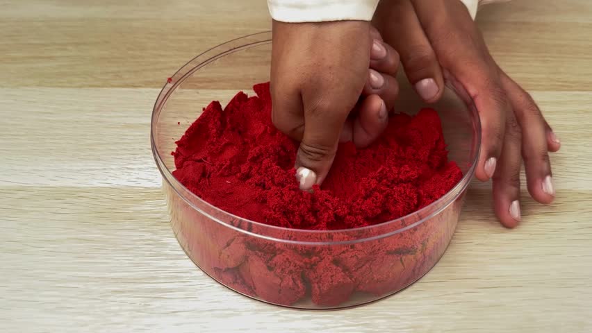 Hands Pressing Kinetic Sand in Clear Dish – Satisfying ASMR Texture and Sensory Play in 4K Ultra HD