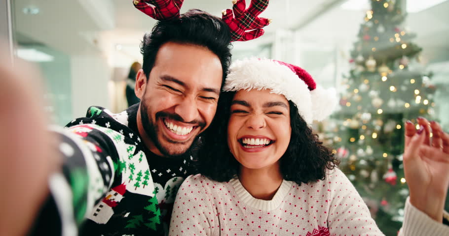 Face, couple and selfie for Christmas, peace sign or excited for celebration in home or photography. Happy, man and laugh with woman on holiday, memory and picture for social media in festive season