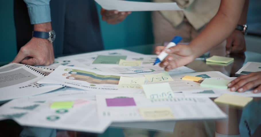 Documents, data analysis or hands of business people in meeting for graphs, budget review or report. Collaboration, talk or financial team in office with investment project, agenda or charts paper
