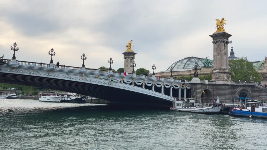 View of the Pont Alexandre III over the Seine River and left bank in the 7th arrondissement of Paris, France.