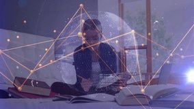 Student reading book and generating 3D sphere with data network then writing notes for learning. Virtual learning, innovative, futuristic, educational, technology, concentration, creative - Powered by Shutterstock - Get 15% off with code: PIKWIZARD15