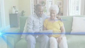 Man positioning tablet to share content, woman leaning in, digital overlay animating in technology. Affection, companionship, mindfulness, relaxation, connectivity, modern, warmth - Powered by Shutterstock - Get 15% off with code: PIKWIZARD15