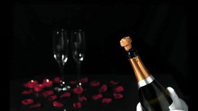 Gloved hand entering, gripping bottle, twisting, popping cork, red smoke billowing, toasting flute. Luxury, celebration, elegance, festivity, sophistication, romance, ambient - Powered by Shutterstock - Get 15% off with code: PIKWIZARD15