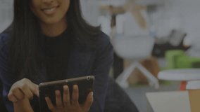 Business analyst tapping tablet and expanding bar charts plus line graphs while reviewing data. Analytics, data visualization, fintech, digital interface, corporate, professional, modern - Powered by Shutterstock - Get 15% off with code: PIKWIZARD15