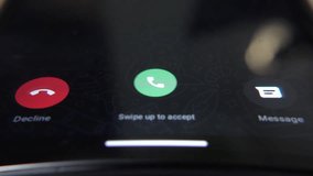 Incoming phone call notification displayed on a smartphone screen, with a swipe-up gesture to answer the call - Powered by Shutterstock - Get 15% off with code: PIKWIZARD15