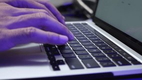 A man working on a laptop, actively typing on the keyboard, representing technology, internet connectivity, and digital workflow. - Powered by Shutterstock - Get 15% off with code: PIKWIZARD15