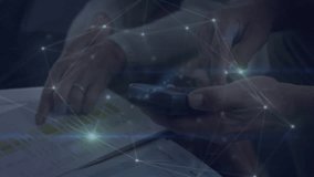 Business associates tracing report, tapping phone screen, activating network overlay reviewing data. Financial, digital, collaboration, analytics, technology, enterprise, professional - Powered by Shutterstock - Get 15% off with code: PIKWIZARD15