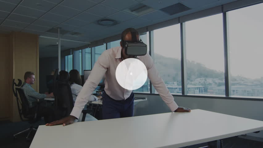 Office tech lead wearing VR headset tapping profile icons and mapping network connections. Technology, innovation, collaboration, digital, futuristic, workspace, networking - Powered by Shutterstock - Get 15% off with code: PIKWIZARD15