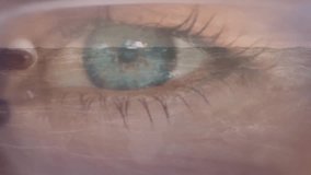 Eyeglass-framed eye initiating world-map fading with fluctuating data line visualizing monitoring. Technology, data, analytics, innovation, connectivity, futurism, visualization - Powered by Shutterstock - Get 15% off with code: PIKWIZARD15