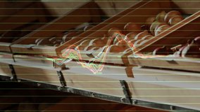 On scene load waveform graphic scrolling over stacked wooden crates, visualizing live produce data. Market, produce, data, visualization, freshness, health, organic - Powered by Shutterstock - Get 15% off with code: PIKWIZARD15