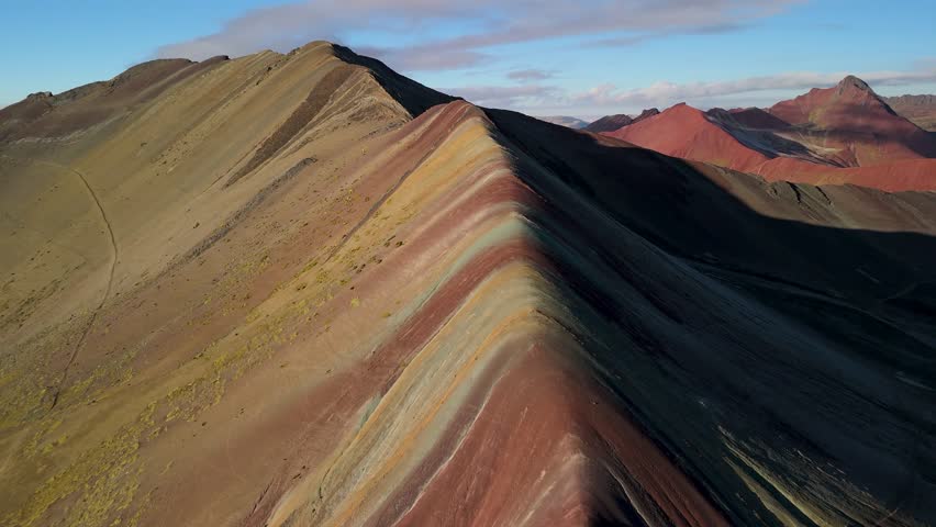 Colourful mountain ridge with sunrise light, Vinicunca rainbow mountain Peru
