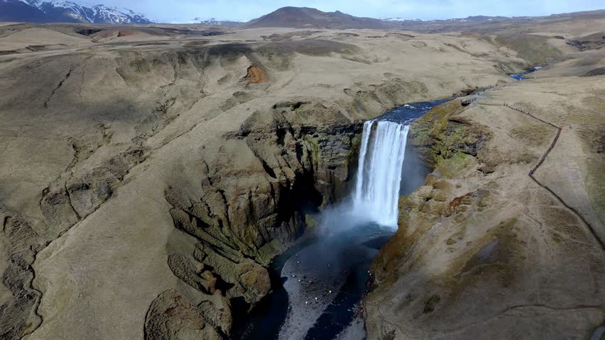 aerial wide angle of skogafoss waterfall with rainbow travel tourist destination in Iceland