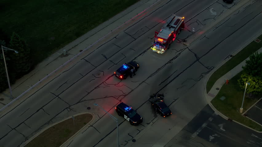Drone Footage of Road Accident at Night with Police Cars and Towing Operation