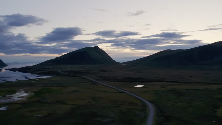 Tufjord Norway Landscape: Scenic Road Winding Through Fjords at Dusk