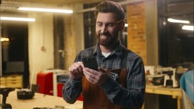 Happy Caucasian man carpenter using mobile phone in workshop wood master craftsman swiping screen device smiling artist male architect order hardwood online shopping guy browse app Internet carpentry - Powered by Shutterstock - Get 15% off with code: PIKWIZARD15