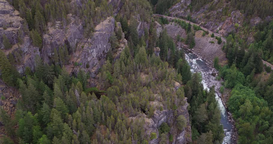 Majestic Mountains, Lush Forests, and a Rushing River in British Columbia, Canada