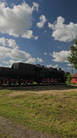 old steam locomotive stands on rails, coal-fired transport, coal locomotive, inside a steam locomotive