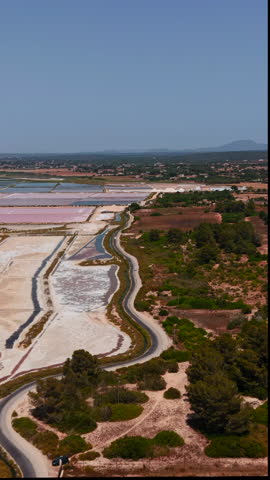 Aerial view of the colorful salt evaporation ponds of es trenc, mallorca, spain