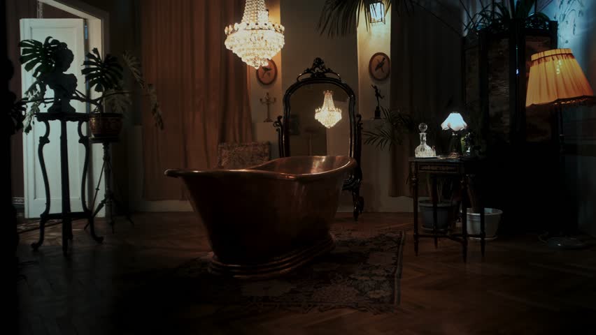 Very beautiful Victorian era bathroom interior recreated from antiques with a large copper bathtub in the middle
