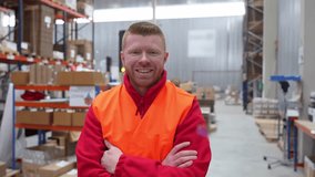 Portrait of a smiling warehouse worker with crossed arms, logistics, and distribution center in background - Powered by Shutterstock - Get 15% off with code: PIKWIZARD15