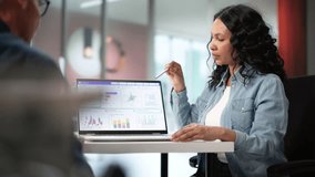 Diverse Team Predicts Market Performance Using Business Analytics Dashboard Data - Powered by Shutterstock - Get 15% off with code: PIKWIZARD15