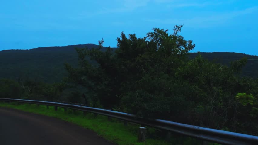 Serene twilight view of the Western Ghats mountains, overlooking Amboli, Maharashtra.