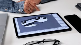 Female Engineer Designing 3D Car Model On Tablet In Factory. - Powered by Shutterstock - Get 15% off with code: PIKWIZARD15